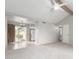 Bright and airy living room features vaulted ceilings and neutral color palette at 6514 S Lakeshore Dr # C, Tempe, AZ 85283