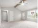 Bright and airy living room features vaulted ceilings and neutral color palette at 6514 S Lakeshore Dr # C, Tempe, AZ 85283