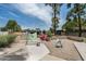 Fun community playground featuring colorful play structures and a sandy area for to enjoy outdoor activities at 6514 S Lakeshore Dr # C, Tempe, AZ 85283