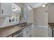 Well-lit kitchen featuring updated appliances, granite countertops, and modern fixtures at 6520 S Pebble Beach Dr, Chandler, AZ 85249