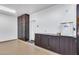 Clean and well organized garage with ample storage and an access door at 7844 W Molly Dr, Peoria, AZ 85383