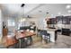 Open-concept living space featuring a kitchen, dining area and a living room with modern finishes at 7844 W Molly Dr, Peoria, AZ 85383