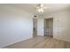 Bright bedroom with closet and built-in storage, complemented by neutral flooring and white trim at 8613 E Citrus Way, Scottsdale, AZ 85250