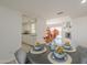 Dining area showing the kitchen and living room, with stylish place settings and inviting decor at 8613 E Citrus Way, Scottsdale, AZ 85250