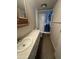 Functional bathroom with a toilet, vanity, mirror, and shower at 9068 E Chambers St, Mesa, AZ 85208