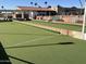Community bocce ball court with benches and a recreational outdoor space at 9068 E Chambers St, Mesa, AZ 85208