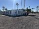 Single-story home featuring desert landscaping and desert trees at 9068 E Chambers St, Mesa, AZ 85208