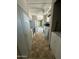 Kitchen area with stove, refrigerator, sink and laundry machines at 9068 E Chambers St, Mesa, AZ 85208