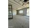 Bright living room with carpet and access to the outside at 9068 E Chambers St, Mesa, AZ 85208