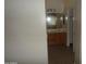 Bright bathroom vanity with wood cabinets, decorative mirror and tiled flooring at 10302 E Cicero Cir, Mesa, AZ 85207