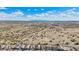 Expansive desert landscape with distant mountains under a bright blue sky, showcasing the neighborhood's natural setting at 10841 W Nosean Rd, Peoria, AZ 85383