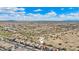 Street view with a desert background under a blue sky marked by a home icon, indicating a real estate location at 10841 W Nosean Rd, Peoria, AZ 85383