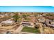 A property featuring solar panels and a large yard, near a residential community at 11124 W Southern Ave, Tolleson, AZ 85353