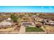 A property featuring solar panels and a large yard, near a residential community at 11124 W Southern Ave, Tolleson, AZ 85353