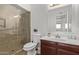 Bathroom featuring a glass shower, modern fixtures, and a well-lit mirror at 11124 W Southern Ave, Tolleson, AZ 85353