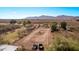 Expansive property featuring mountain views presenting opportunities for building or recreational use at 11124 W Southern Ave, Tolleson, AZ 85353