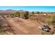 Acreage presenting mountain views offering vast potential for development or recreation at 11124 W Southern Ave, Tolleson, AZ 85353