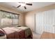 Inviting bedroom features a window view, closet, neutral color palette, and comfortable carpeting at 12787 S 175Th Ave, Goodyear, AZ 85338