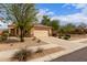 Charming single-story home features a desert landscape and a two-car garage at 12787 S 175Th Ave, Goodyear, AZ 85338