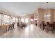 Open living room with neutral tones, tile floors, and an inviting atmosphere at 12787 S 175Th Ave, Goodyear, AZ 85338