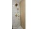 Modern shower with bronze fixtures, tiled walls, and shower niches at 12807 N 21St Dr, Phoenix, AZ 85029