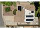 Overhead of home's roof featuring solar panels and roof-mounted air conditioner unit at 12809 N 50Th St, Scottsdale, AZ 85254