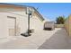 Spacious backyard with basketball court, storage shed, and perimeter wall at 12809 N 50Th St, Scottsdale, AZ 85254