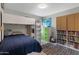 bedroom features a loft bed, storage, and playful decor to create a cheerful atmosphere at 12809 N 50Th St, Scottsdale, AZ 85254