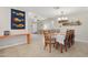 Spacious dining area with tile flooring, ceiling fan, modern lighting, and charming decor at 12809 N 50Th St, Scottsdale, AZ 85254