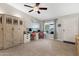 Home office featuring a ceiling fan, neutral walls, tile flooring, and natural light at 12809 N 50Th St, Scottsdale, AZ 85254