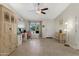 Cozy home office featuring a ceiling fan, tile floors, and a sunny window at 12809 N 50Th St, Scottsdale, AZ 85254