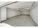 Spacious garage with epoxy floors, bright lighting, and storage possibilities for the savvy home owner at 15602 N 56Th Pl, Scottsdale, AZ 85254