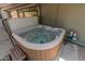 Enjoy the hot tub on the covered patio, offering a luxurious and relaxing outdoor experience at 15602 N 56Th Pl, Scottsdale, AZ 85254
