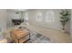 Spacious living area features neutral tones, large windows with shutters, and seamless flow to dining space at 15602 N 56Th Pl, Scottsdale, AZ 85254