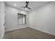 Minimalist bedroom featuring recessed lighting, hardwood floors, and a modern ceiling fan at 16706 N 109Th Way, Scottsdale, AZ 85255