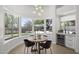 Cozy breakfast nook with a built-in bar area, offering a delightful space for casual dining and relaxation at 16706 N 109Th Way, Scottsdale, AZ 85255