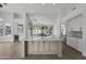 Bright kitchen featuring stainless appliances, an island with marble countertops, and hardwood floors at 16706 N 109Th Way, Scottsdale, AZ 85255