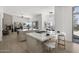 Modern kitchen with dual islands, marble countertops, and stainless steel appliances, perfect for entertaining at 16706 N 109Th Way, Scottsdale, AZ 85255