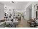 Bright living area with open floor plan, modern decor, and a clear view of the dining and kitchen at 16706 N 109Th Way, Scottsdale, AZ 85255