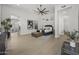 Spacious bedroom with high ceilings, a ceiling fan, and a decorative sitting area at 16706 N 109Th Way, Scottsdale, AZ 85255