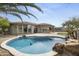 Relaxing pool and patio area, perfect for entertaining with outdoor living and a desert landscape at 16706 N 109Th Way, Scottsdale, AZ 85255