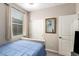 Bedroom featuring a ceiling fan, carpet, and sliding closet doors at 17308 W Daley Ln, Surprise, AZ 85387