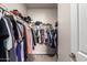 Spacious walk-in closet with ample hanging space at 17308 W Daley Ln, Surprise, AZ 85387