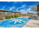 Bright and fun splash pad featuring colorful designs, perfect for active play and cooling off on warm days at 17308 W Daley Ln, Surprise, AZ 85387