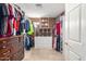 Spacious walk-in closet with custom shelving and ample storage at 18440 N 43Rd Dr, Glendale, AZ 85308