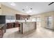 Bright kitchen with stylish cabinetry, a functional island, and modern appliances at 18440 N 43Rd Dr, Glendale, AZ 85308