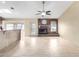 Bright living room with tile flooring, fireplace, and a cozy atmosphere for relaxation at 18440 N 43Rd Dr, Glendale, AZ 85308