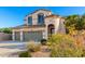 Attractive home exterior displaying manicured landscaping and a welcoming entryway at 19137 W Pasadena Ave, Litchfield Park, AZ 85340