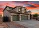 Charming two-story home featuring a 3-car garage and a beautiful landscaped front yard at 19137 W Pasadena Ave, Litchfield Park, AZ 85340