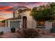 Charming two-story home featuring a 3-car garage and a beautiful landscaped front yard at 19137 W Pasadena Ave, Litchfield Park, AZ 85340